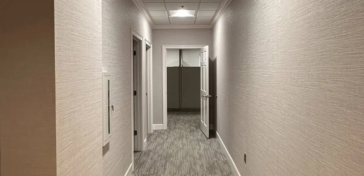 Hallway carpet and wall covering, after renovation