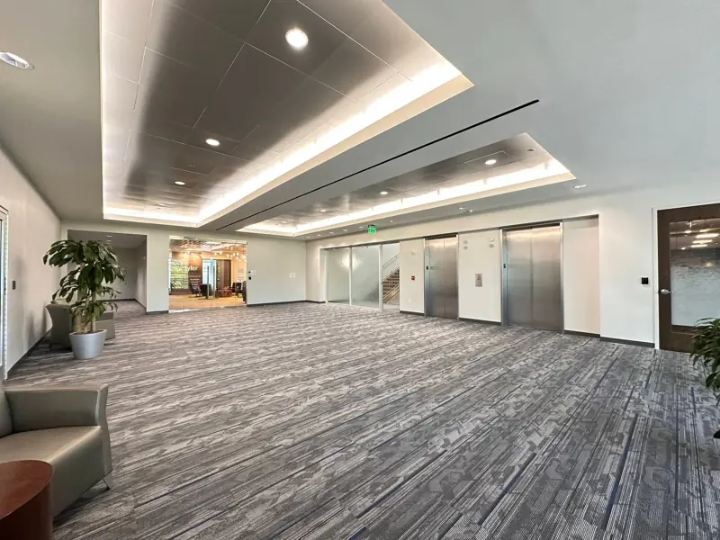Office lobby with new plank and carpet flooring