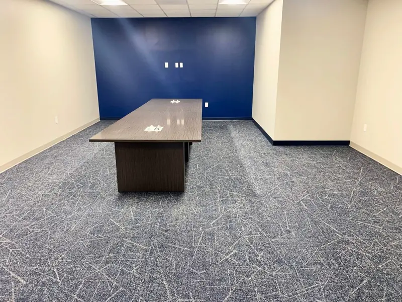 Conference room with patterned carpet tile