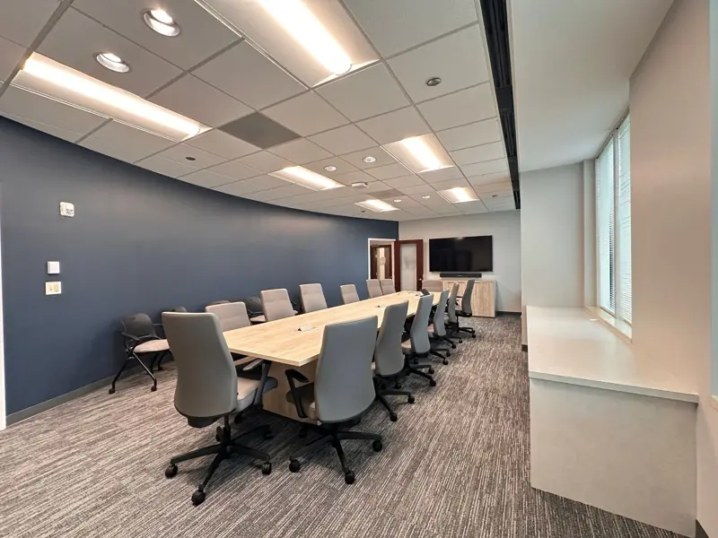 Conference room with navy accent wall