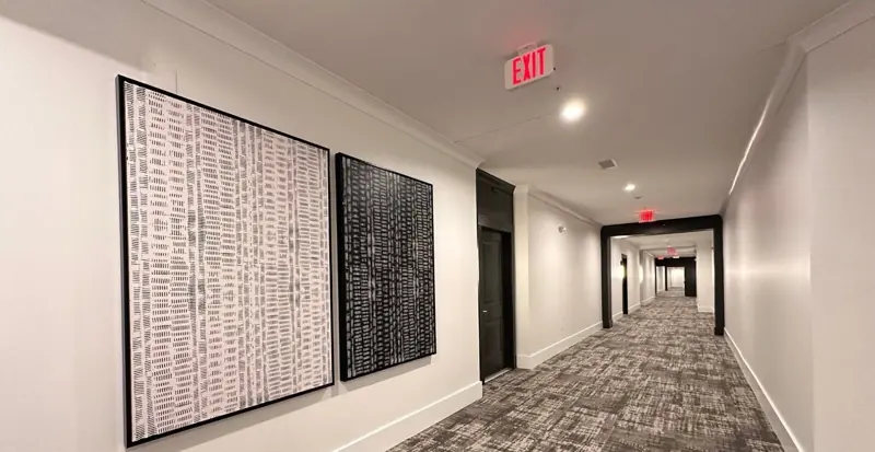Corridor refreshed with paint, carpet and artwork