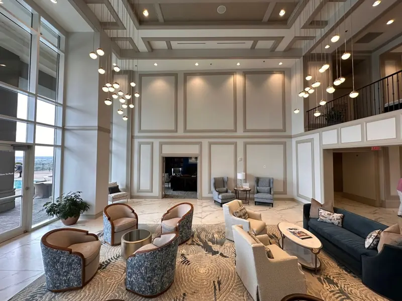 Two-story lounge with painted wall paneling