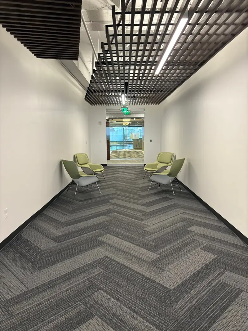Office corridor with herringbone carpet tile
