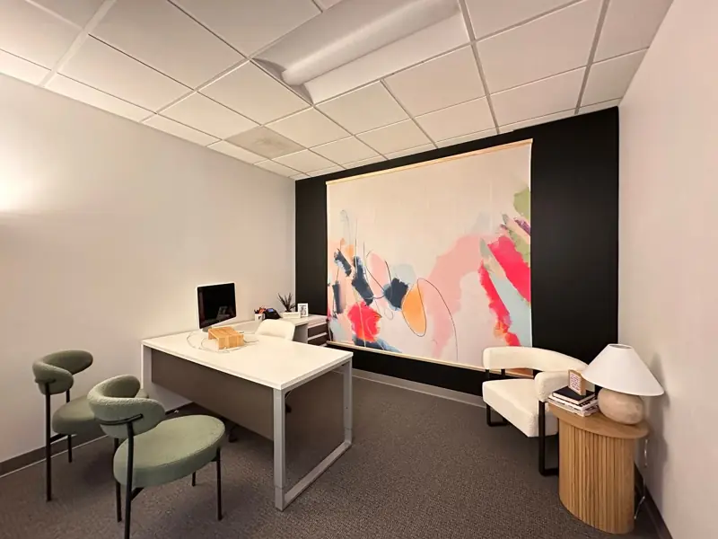 Private office with large-format mural wall